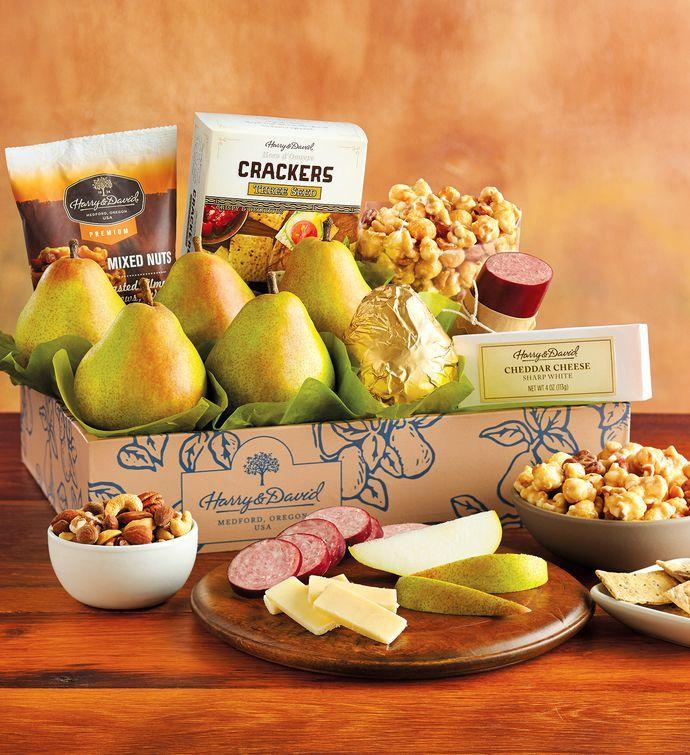 Our collection of new parent gifts includes this fruit and snack box, which includes pears, premium popcorn, cheese, summer sausage, and more. 