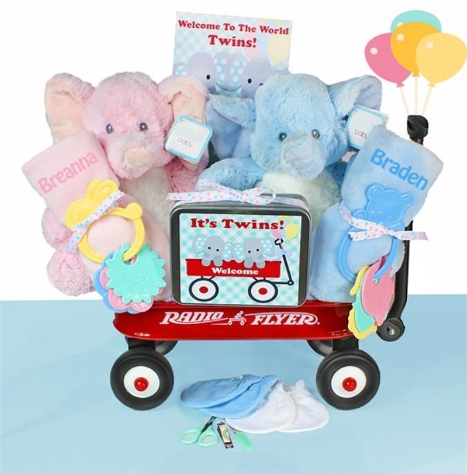 Our cool baby gifts for twins, triplets, and more include this mini wagon with two plush elephants, personalized blankets, and more. 